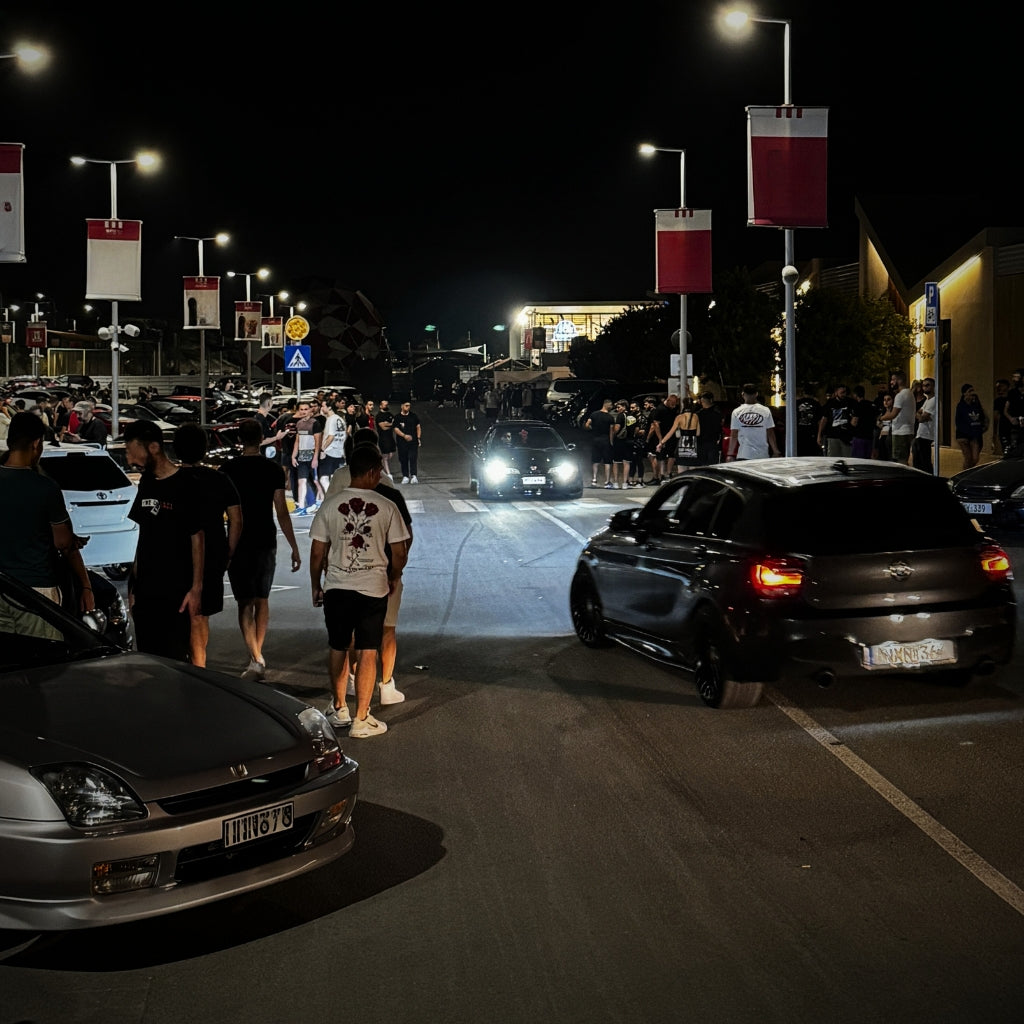 cars at a car show with people around them cyprus car meet